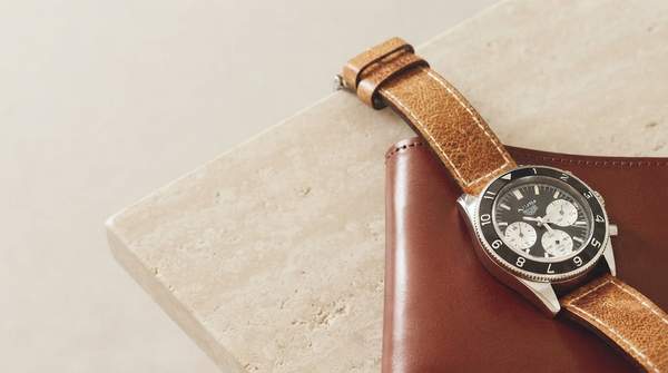 Editorial illustration for Leather or Vulcanized Rubber: Choosing the Luxury Watch Strap That Fits Your Life